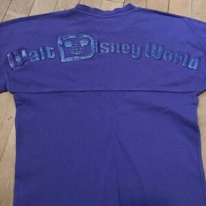 Barely worn Walt Disney World youth small purple spirit jersey